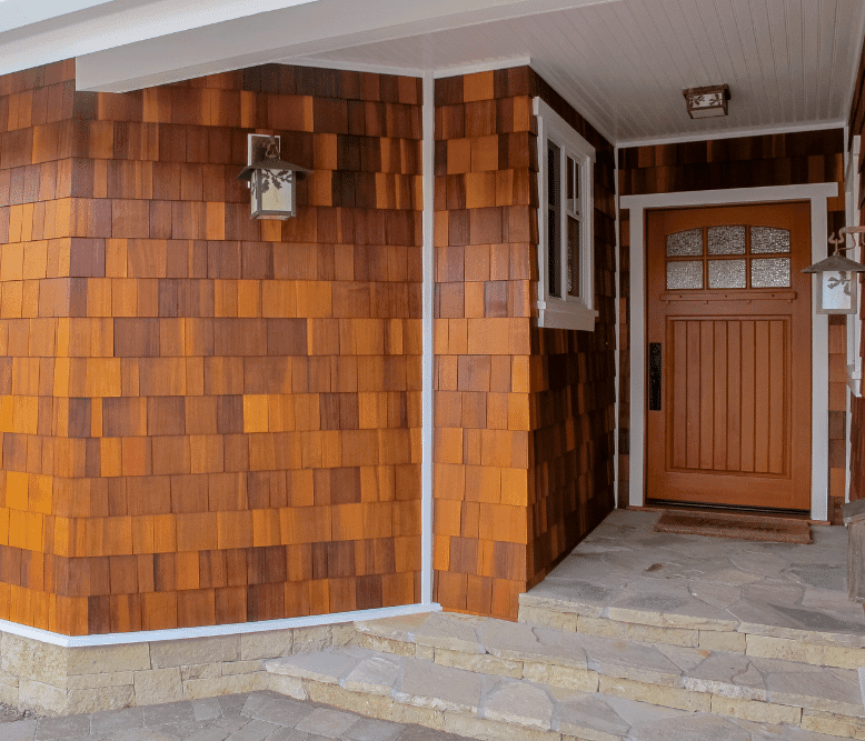 Real cedar wood shingle siding on a craftsman porch