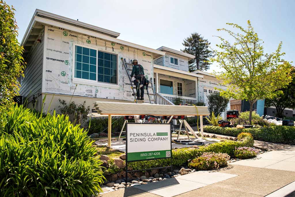 Peninsula Siding Company installing James Hardie siding on a Bay Area home